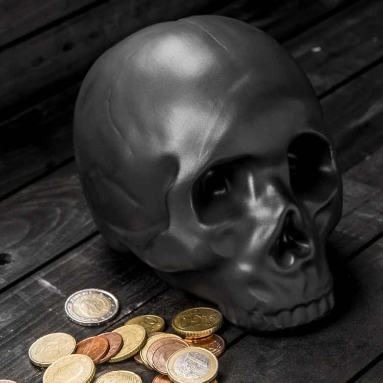 KIKKERLAND CERAMIC SKULL COIN BANK - Kikkerland